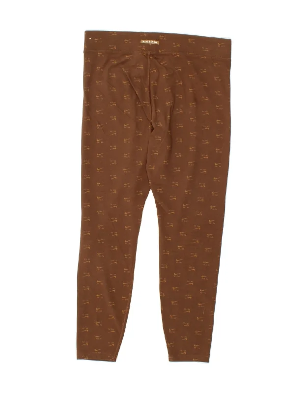 NIKE Womens Graphic Leggings UK 16 Large  Brown Polyester